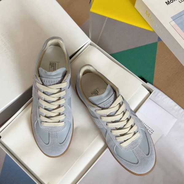 Maison Margiela MM6 Paar moralische Trainingsschuhe