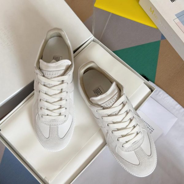 Maison Margiela MM6 Paar moralische Trainingsschuhe