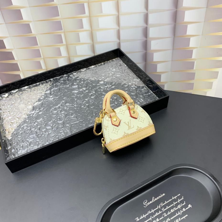 replica,schuhe,beste,kaufen,1:1,besten,seiten,Replik,turnschuhe,sneakers  M01706 ️Louis Vuitton lv Mini-Muscheltaschen-Schlüsselanhänger (3E0B)