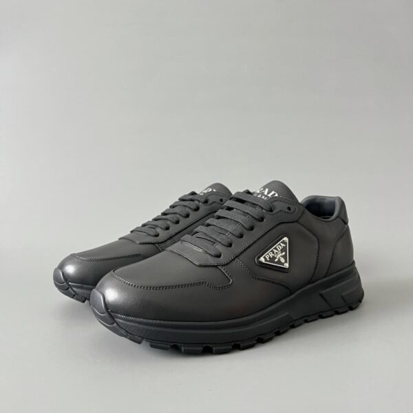 replica,schuhe,beste,kaufen,1:1,besten,seiten,Replik,turnschuhe,sneakers PRADA PRAX 1 Leder-Freizeitschuhe mit runder Zehenpartie, Schnürung und Dreieckslogo, niedrig geschnitten, für Herren (NU2SC)